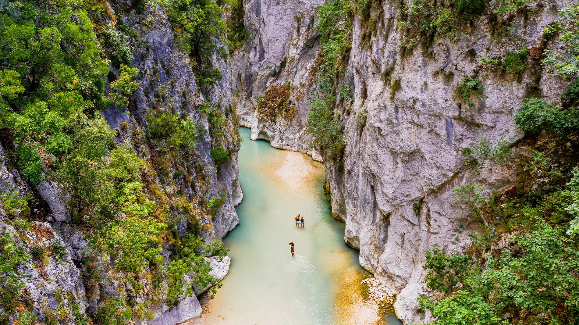 The Acheron River flows through many picturesque villages in Greece, including Glykí, where it cuts through a stunning gorge.