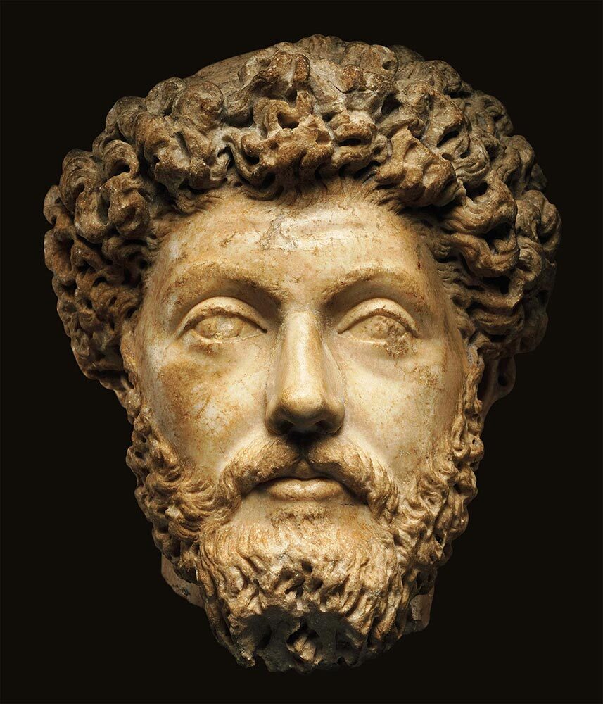 A bust of an older Marcus Aurelius in Carrara marble