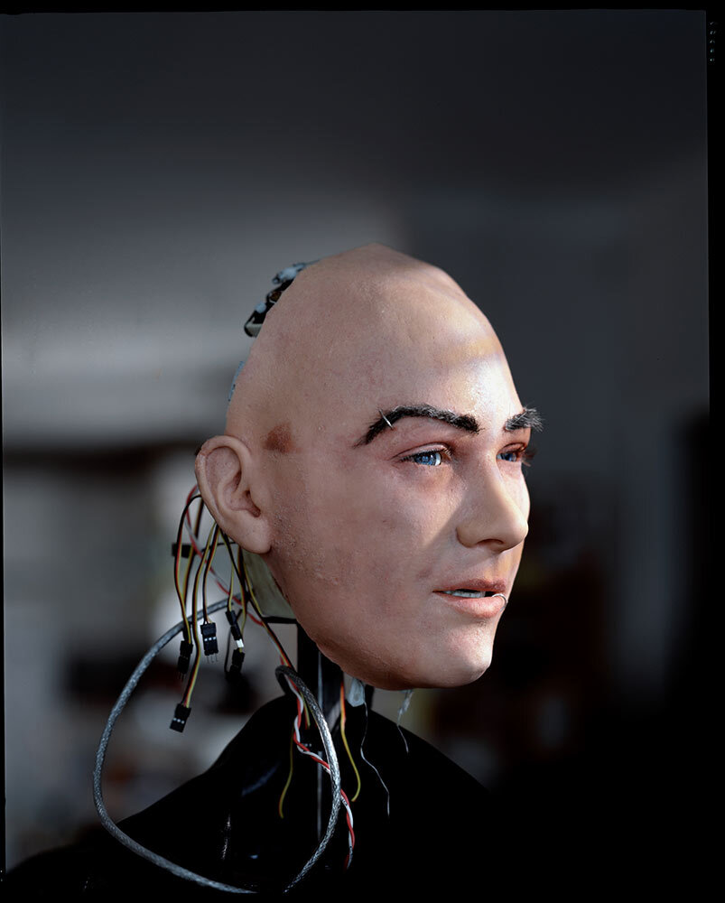 the face of a robot that looks eerily like a human