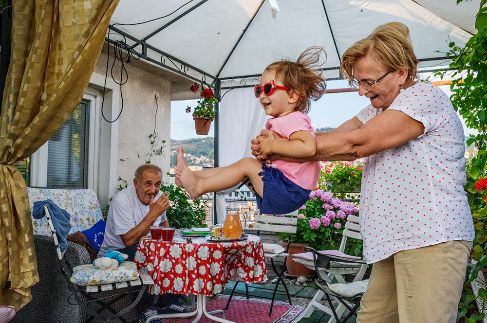 a grandmother playing with her grandchild