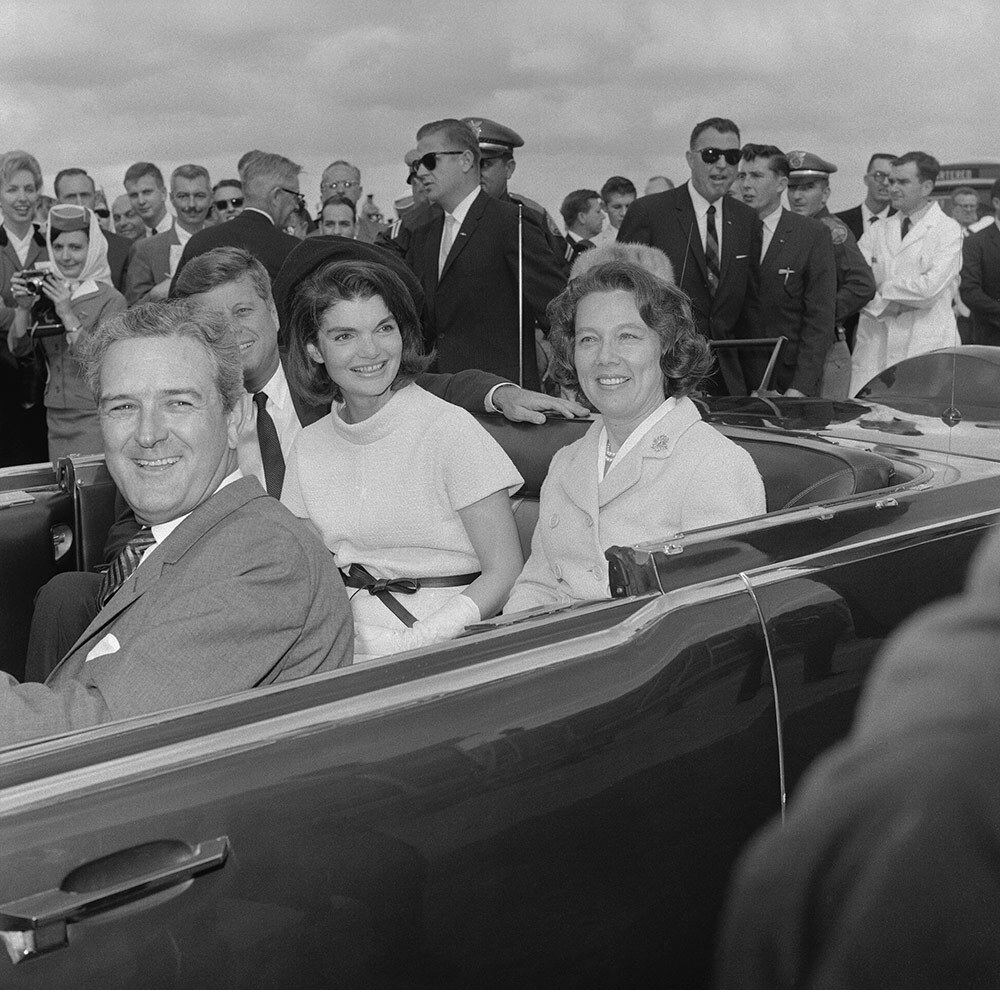 Jackie Kennedy, center, and her husband, President John F. Kennedy, on that fateful November 1963 trip to Texas