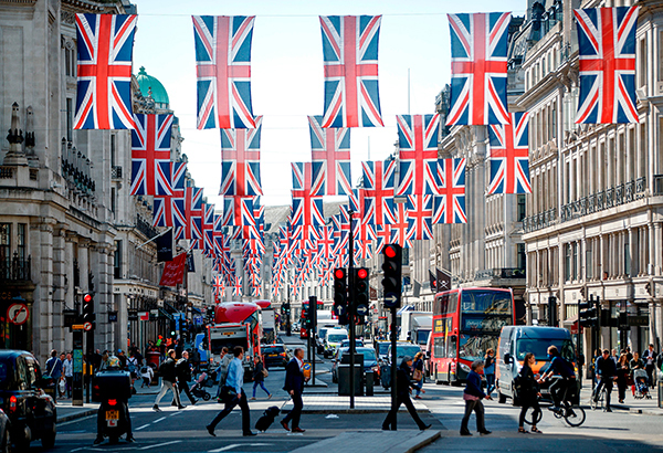 Union Jack flags decorate London’s Regent Street ahead of the wedding of Prince Harry to American actress Meghan Markle in May 2018.