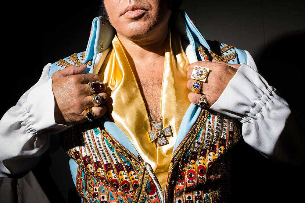 Mario Kombou, an Elvis tribute artist from London, England prepares to perform at the Daisy Theater during the Images of the King showcase during Elvis Week in Memphis, Tennessee.