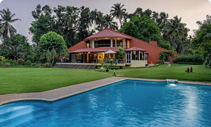 Poolside serenity awaits in Alibag, India.