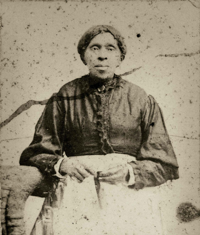 An old black and white picture of a woman