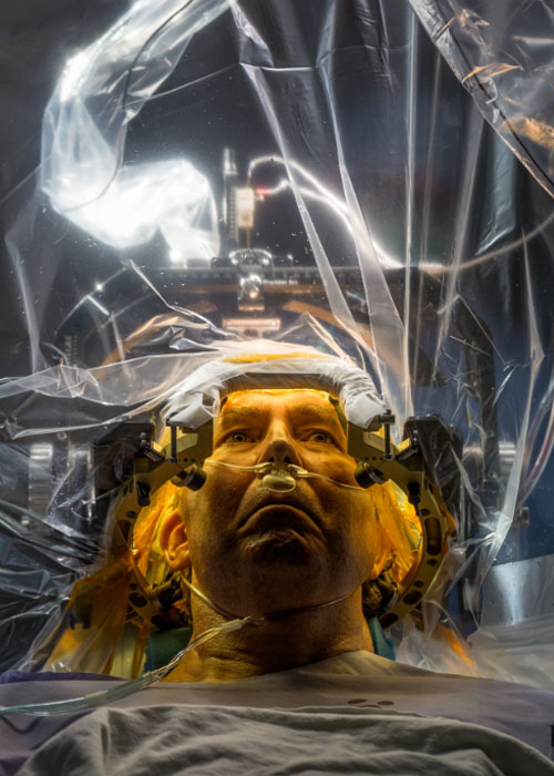 At the University of Florida, Parkinson’s disease patient Russell Price undergoes surgery to implant a deep brain stimulation (DBS) lead that will deliver electrical impulses to motion-controlling parts of his brain.  