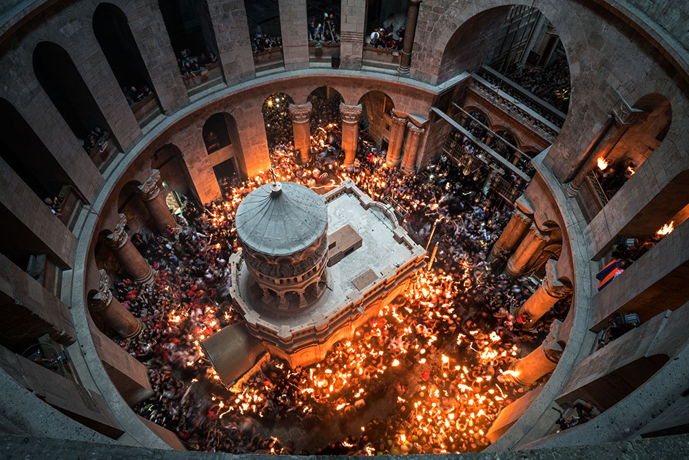 Worshippers in Church of the Holy Sepulchre surround Edicule, Jerusalem