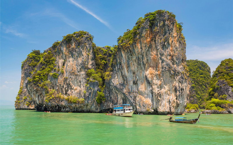 The best time for travellers to go on night-time kayaking tours near Thailand's famous Phang Nga Bay to see bioluminescent plankton is during a new moon.