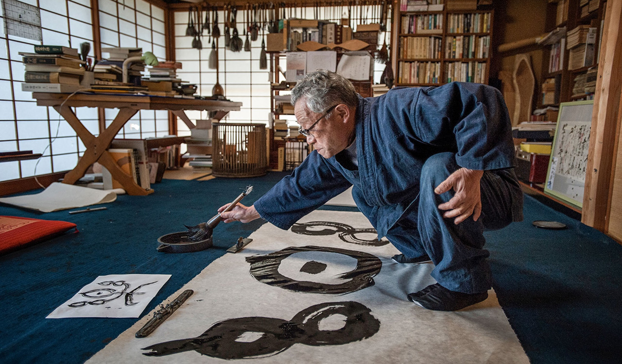 Master calligrapher Tadashi Kawamata writes on washi, traditional paper that is still handmade in some parts of Japan.