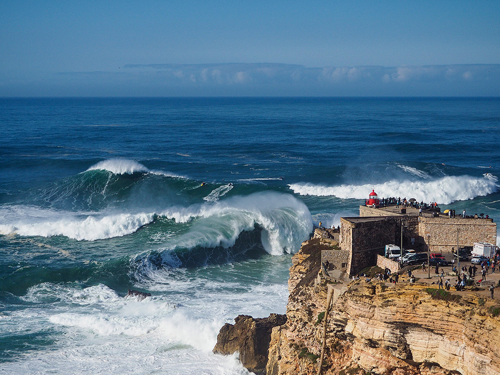 Big waves by the lighthouse at the Fort of Sao Miguel Arcanjo