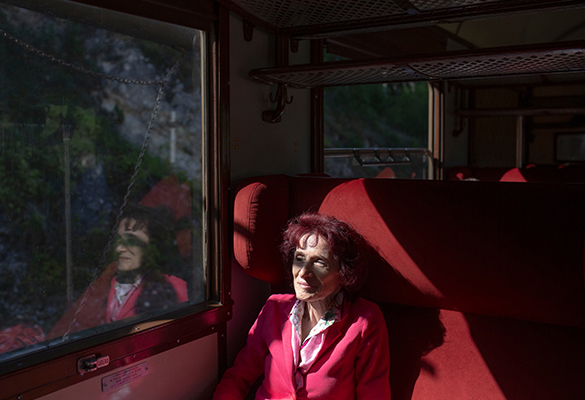 A woman onboard Italy’s “Trans-Siberian” railway takes in the beauty of the Abruzzo region. The historic Sulmona-Carpinone route rekindles a connection to the heyday of train travel in Italy.