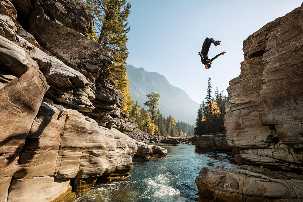 A person cliff dives in Montana