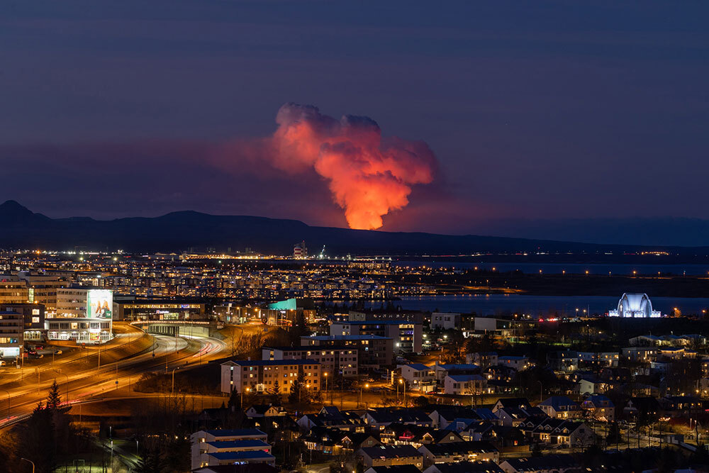 A volcanic fissure spews lava and smoke as it erupts near the town of Grindavík, Iceland, on January 14, 2024.