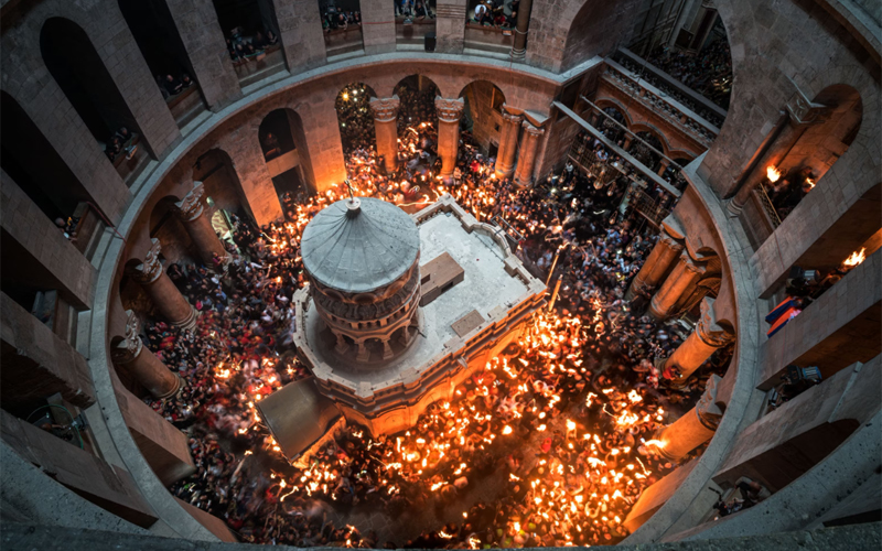 Worshippers in Jerusalem’s Church of the Holy Sepulchre surround the restored Edicule, a shrine that Christian tradition says was built over the burial place of Jesus Christ. The shrine attracted global attention in 2016 when restorers uncovered remnants of an ancient tomb behind its ornate walls. 