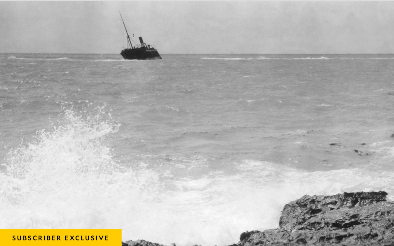 A shipwreck sits off the coast of Bermuda's shore.