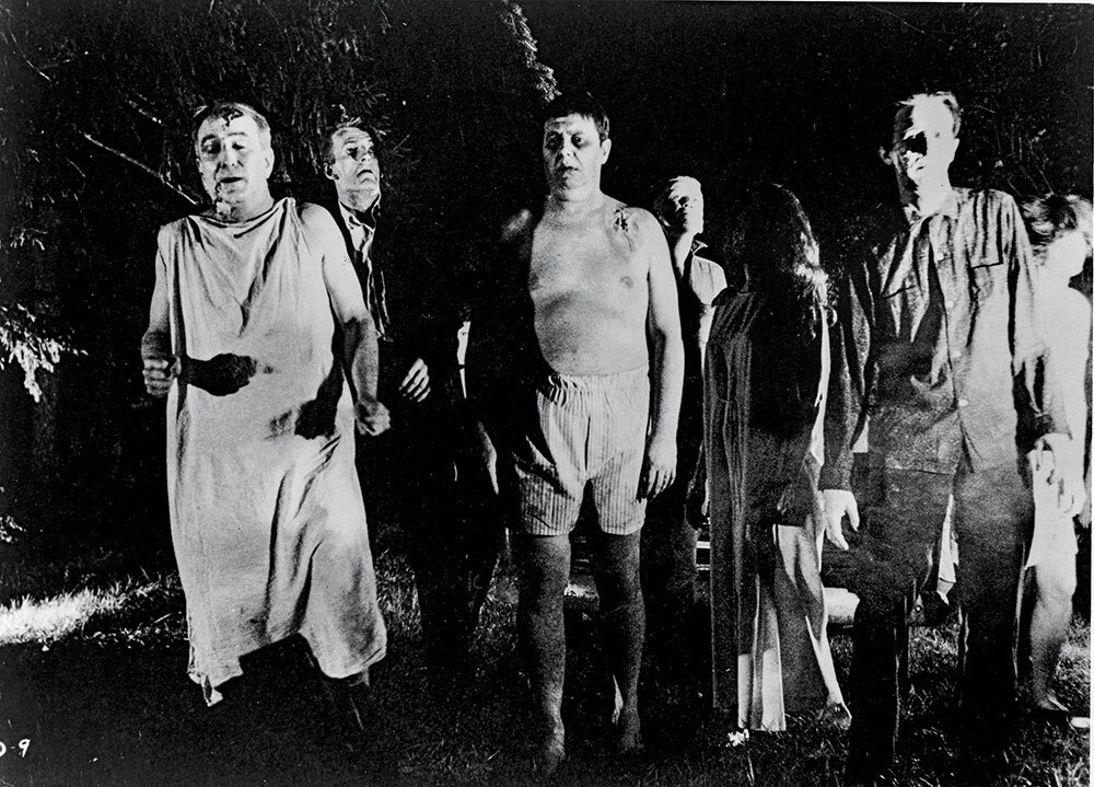 A black and white picture of actors with makeup to look like the undead.