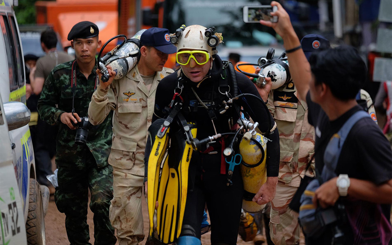 British cave diver John Volanthen emerges from Tham Luang. Volanthan along with Richard Stanton, both elite cave divers from England, found the boys alive a mile and half deep inside the cave.