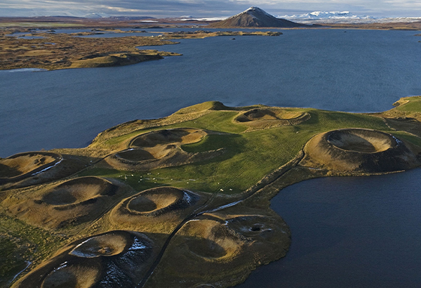 Craters at Lake Myvatn in Iceland are among the country's many green landscapes.