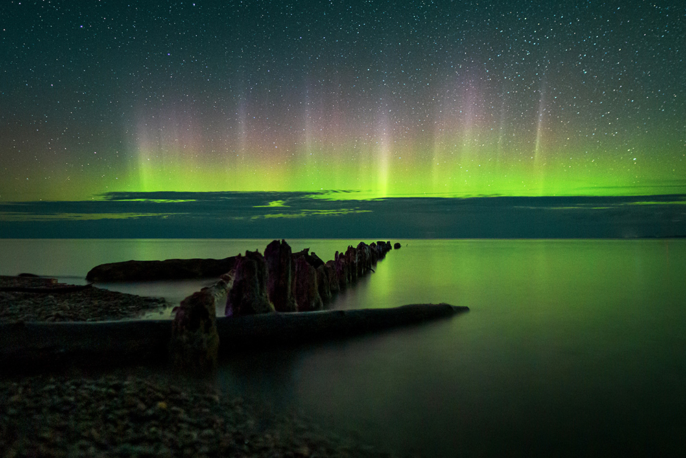 The Aurora borealis in the skies above Michigan's Upper Peninsula on Lake Superior