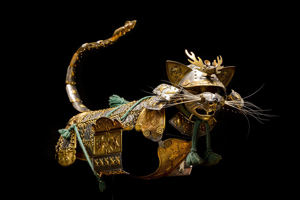 "Samurai" cat armor by Jeff de Boer features vanquished mice on the helmet and tailpiece.