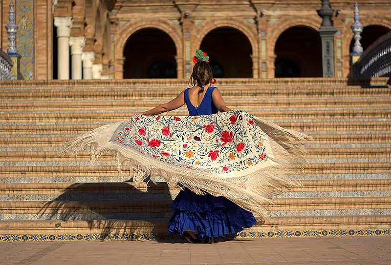 A flamenco dancer in the Plaza of Spain Seville