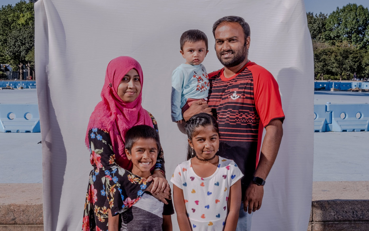 Originally from Pondicherry, India, the Maricar family now lives in Queens. In this portrait are Fahira Maricar, her husband Abdul, and their three children, Afrah, Afeef, and Arham, held by his father.