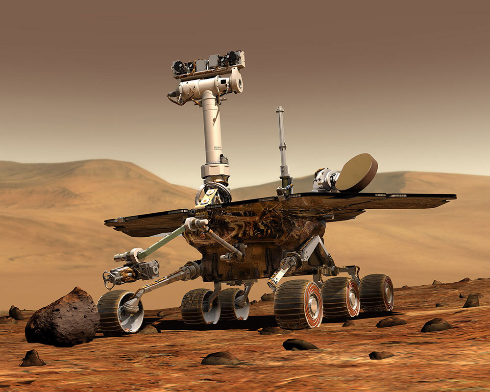 A NASA Mars Exploration Rover sits on the surface of Mars in an illustration.