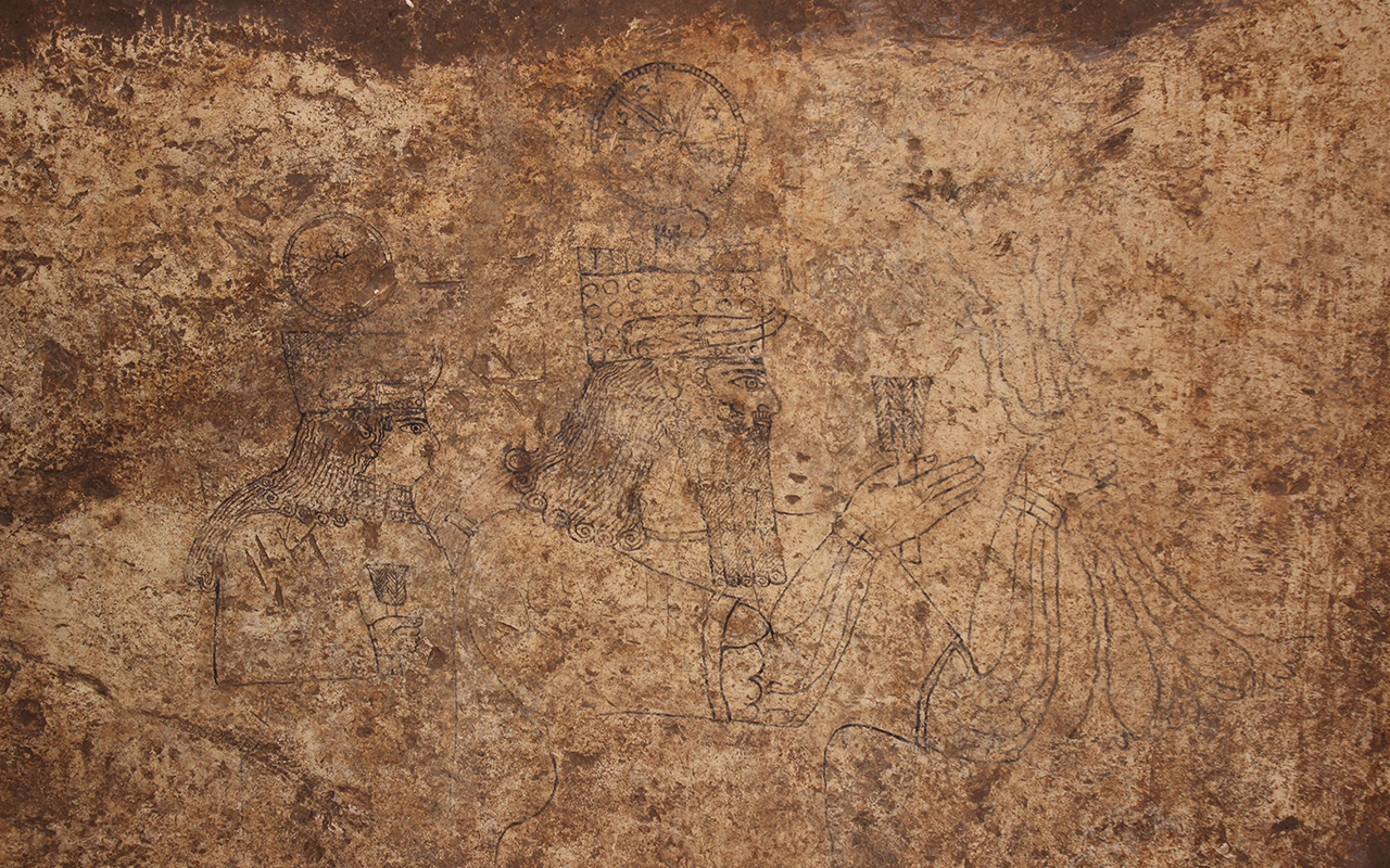 An ancient drawing carved into stone showing a procession of gods in Turkey.