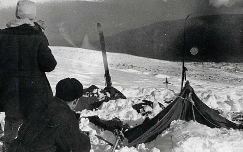 Soviet investigators examine the tent belonging to the Dyatlov Pass expedition on February 26, 1959. The tent had been cut open from inside, and many team members had fled in socks or bare feet. 