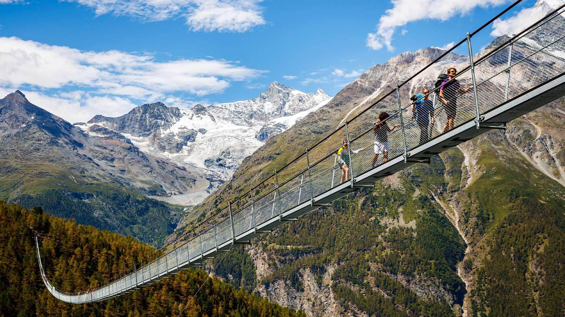 The world's longest pedestrian suspension bridge is now open in the Swiss Alps.