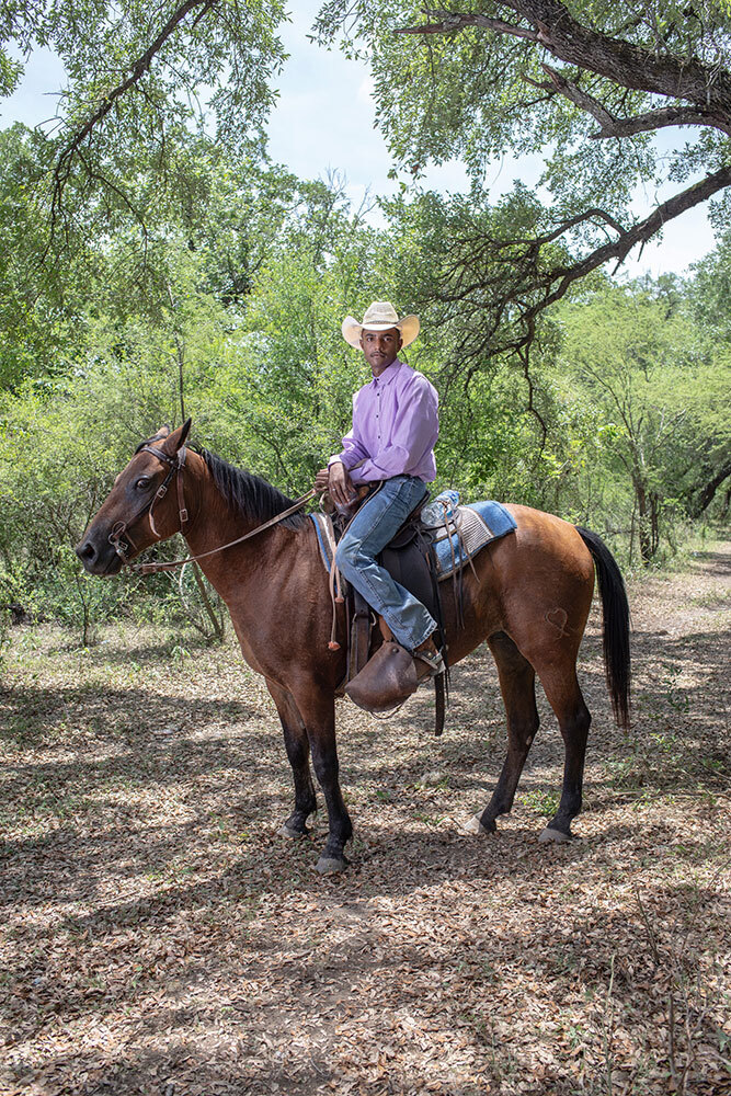 Adan Salazar, a member of the cabalgata, travels 20 miles to celebrate Juneteenth in Nacimiento.