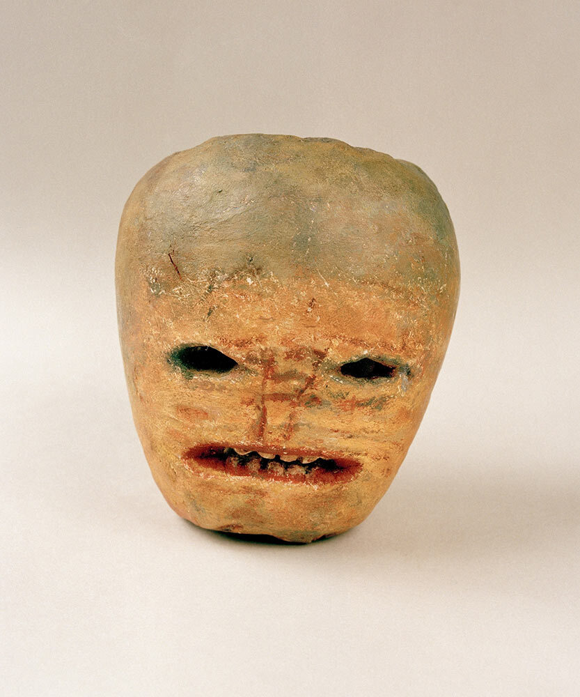 A plaster cast of an early 1900s jack-o’-lantern