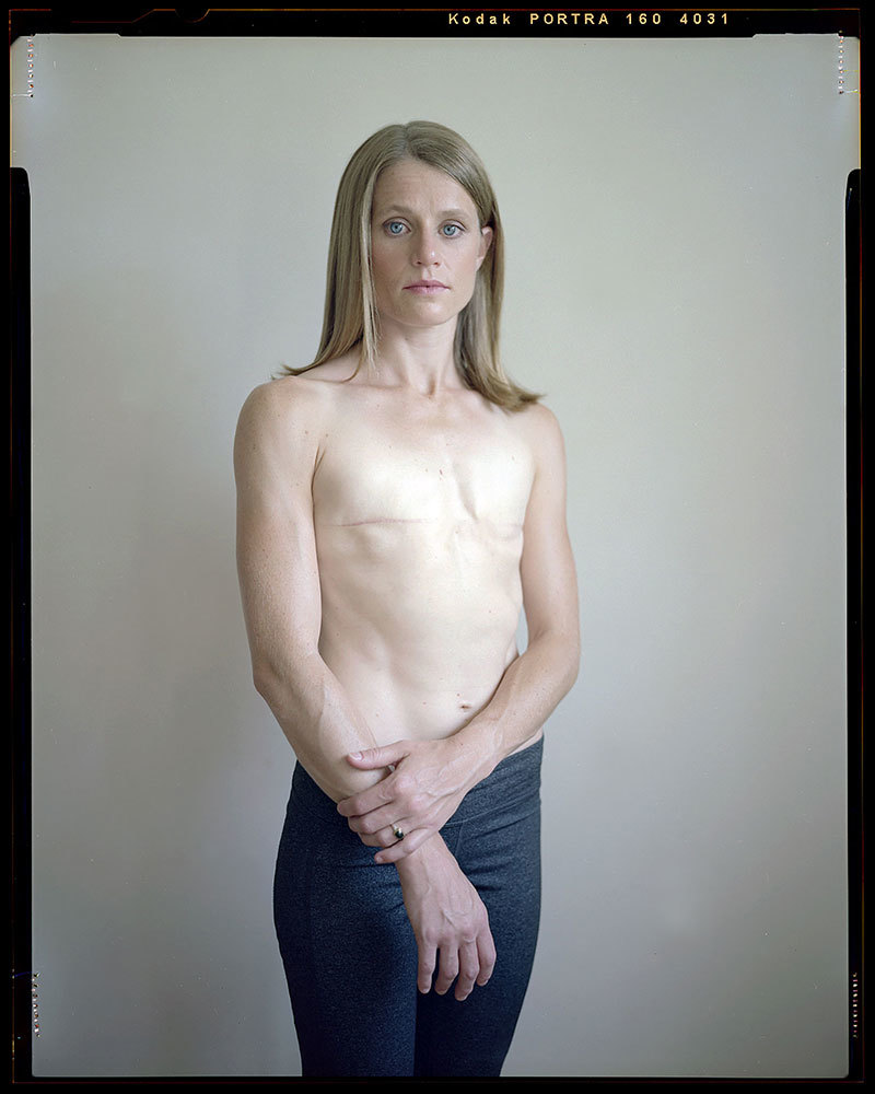A photograph of a woman topless