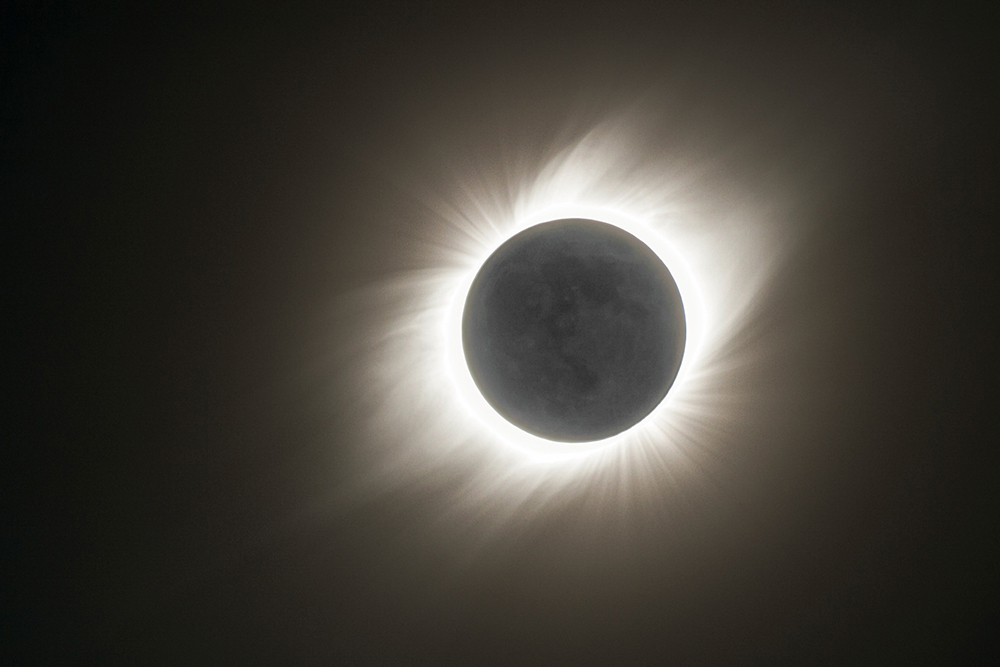 A stacked composite photo shows the solar corona during a total solar eclipse, 2009