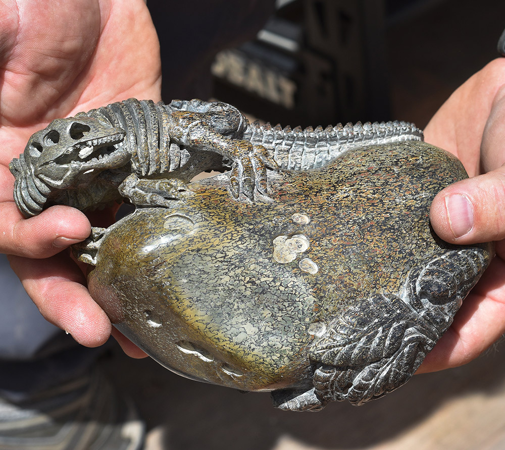 This carving from dinosaur bone, priced at almost $50,000, was part of a recent seizure of thousands of pounds of fossils that had been illegally excavated from federal and state lands in Utah.