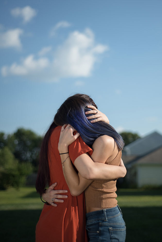 Two women hugging