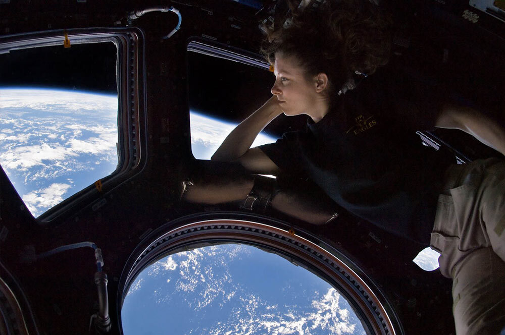 Astronaut Tracy Caldwell Dyson looks down on Earth while serving as the flight engineer on Expedition 24 to the International Space Station