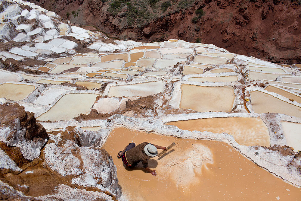 A picture of terraced pools crusted white