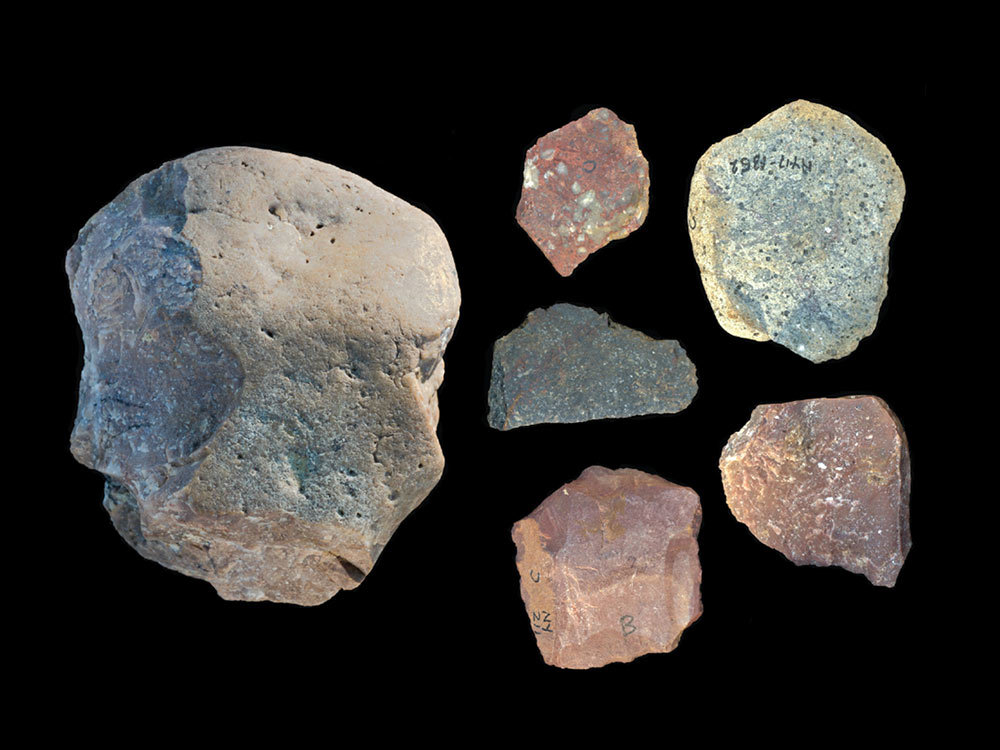 A picture of stone tools on a black background