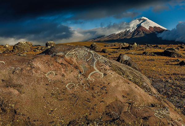 Clouds roll over the rocky landscape of Cotopaxi National Park in Ecuador.