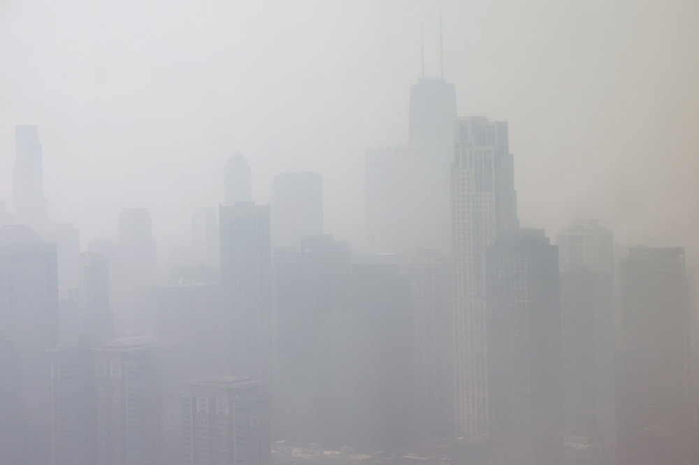 A smoky haze from the wildfires in Canada blankets Chicago, Illinois, on June 28, 2023. Wildfire smoke can be harmful when inhaled, but even after the air clears, it leaves behind ​threatening compounds.