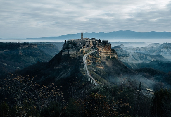 The Italian village of Civita di Bagnoregio is disappearing. Every year, seven centimeters of land tumbles into the ravine below and only seven people still call the place home. However, one million tourists stopped by to see it in 2019.