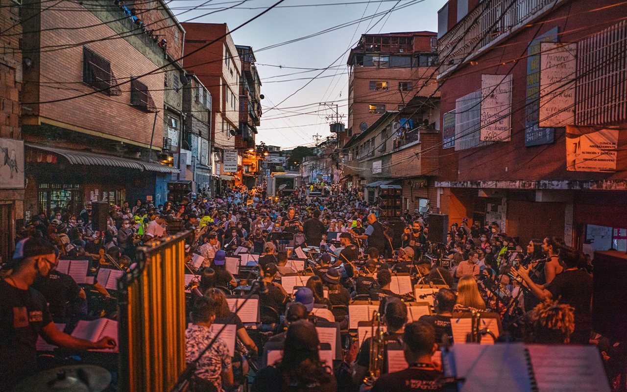 Members of the Orquesta Sinfónica Gran Mariscal de Ayacucho play their new album, Sinfonía Desordenada (Disorderly Symphony), during a public performance on November 12, 2021 in Caracas, Venezuela.