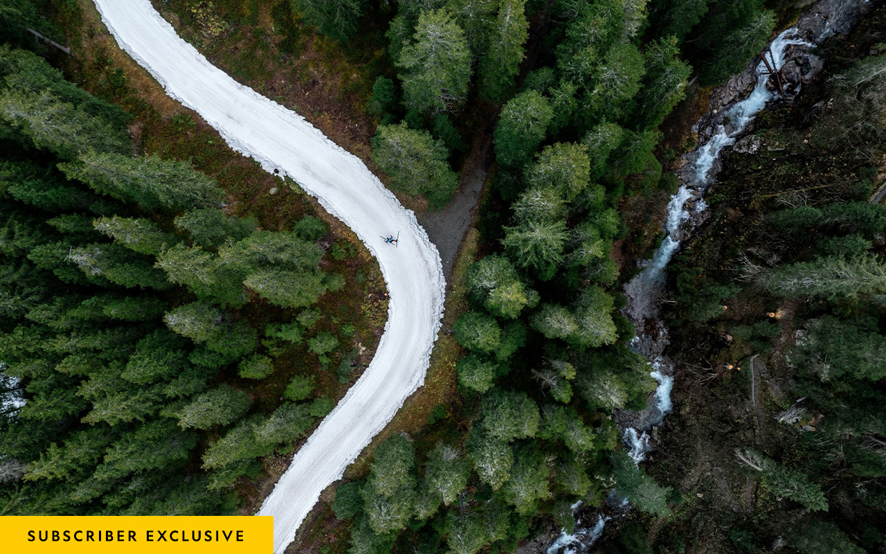 At Davos, Switzerland, in late October, a skier navigates a cross-country trail made of artificial snow produced the previous winter.