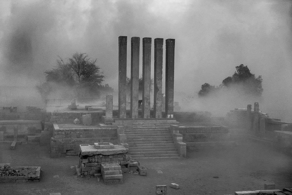 A photo of columns from ruins