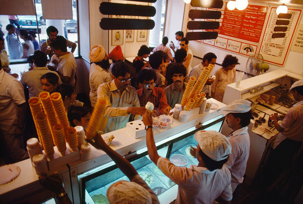 An ice cream shop in New Delhi, India, keeps up with the demand of customers in the early 1980s. Called Nirula's 21, the shop is part of the oldest fast food chain in India