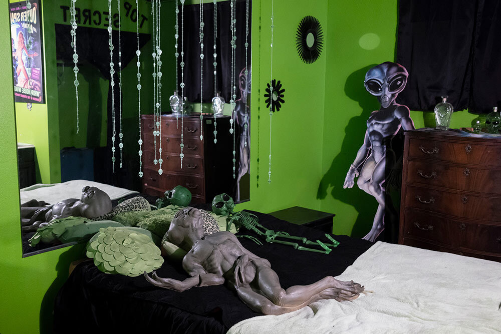 an alien-themed room in a brothel