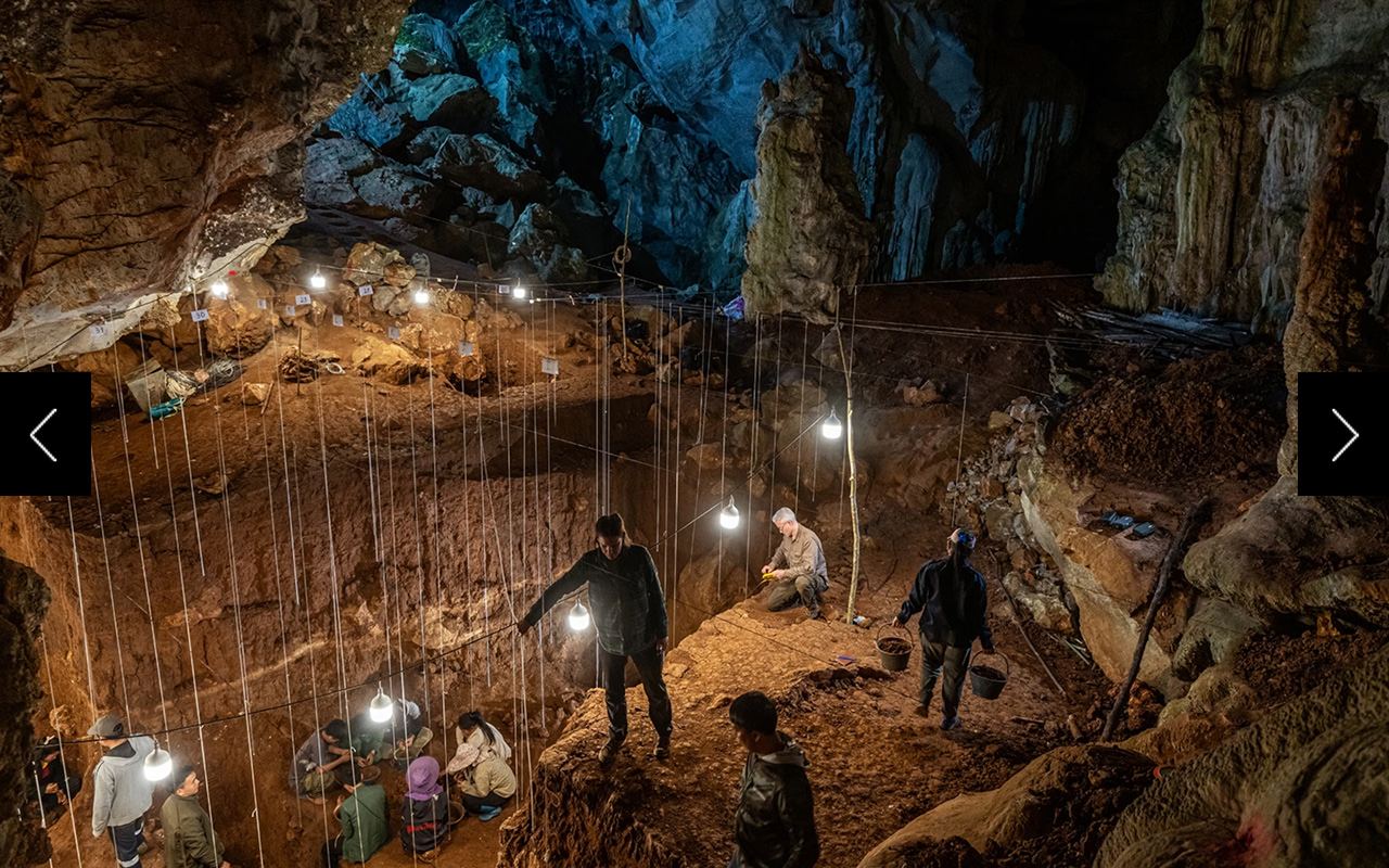 Paleoanthropologist Fabrice Demeter (kneeling) and his team of experts have been working in Tam Pa Ling Cave since 2009. They’ve found the fragmentary remains of seven Homo sapiens, the oldest dating back 30,000 years before the main H. sapiens exodus from Africa. 