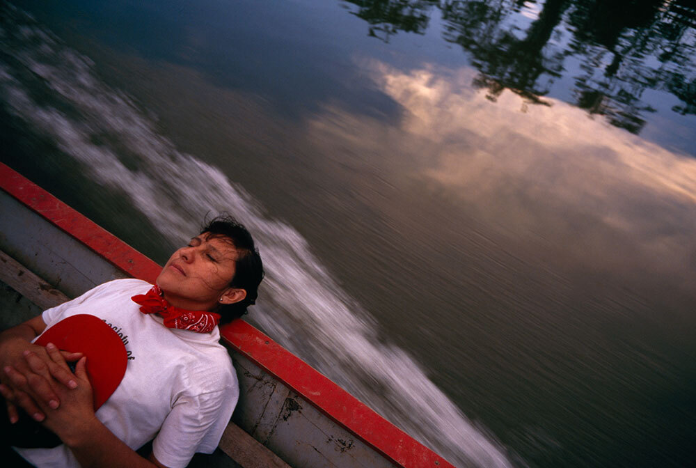 A person relaxes in a boat