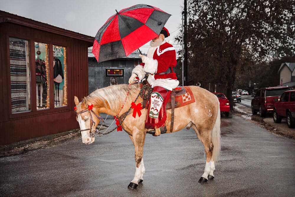 Cowboy Santa mounts up to deliver candy to children in this Texas town